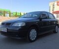 Черный Опель Астра, объемом двигателя 1.4 л и пробегом 148 тыс. км за 4900 $, фото 1 на Automoto.ua