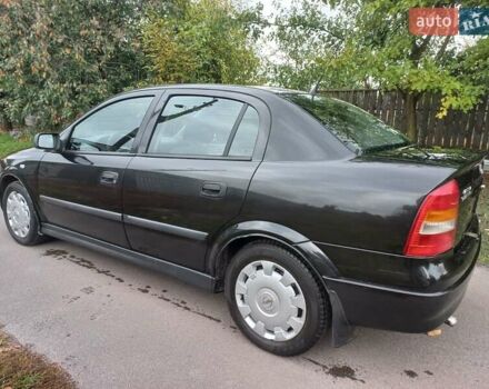 Черный Опель Астра, объемом двигателя 1.4 л и пробегом 220 тыс. км за 4500 $, фото 2 на Automoto.ua