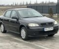 Черный Опель Астра, объемом двигателя 1.4 л и пробегом 260 тыс. км за 3600 $, фото 1 на Automoto.ua