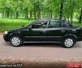 Черный Опель Астра, объемом двигателя 1.4 л и пробегом 200 тыс. км за 3499 $, фото 1 на Automoto.ua