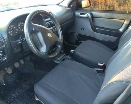 Чорний Опель Астра, об'ємом двигуна 1.4 л та пробігом 250 тис. км за 3200 $, фото 11 на Automoto.ua