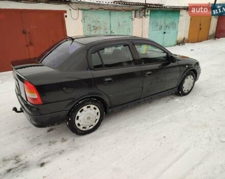 Черный Опель Астра, объемом двигателя 1.36 л и пробегом 300 тыс. км за 2150 $, фото 4 на Automoto.ua