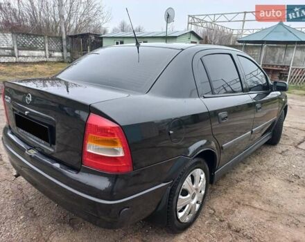 Черный Опель Астра, объемом двигателя 1.4 л и пробегом 230 тыс. км за 4500 $, фото 2 на Automoto.ua