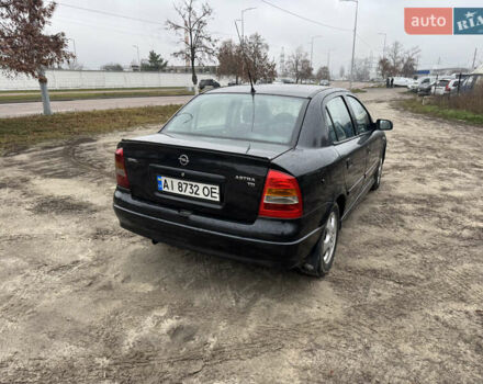 Черный Опель Астра, объемом двигателя 1.7 л и пробегом 300 тыс. км за 2999 $, фото 7 на Automoto.ua