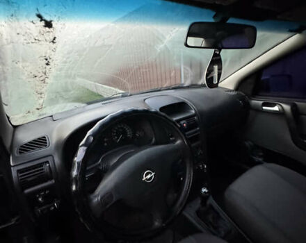 Черный Опель Астра, объемом двигателя 1.6 л и пробегом 240 тыс. км за 2500 $, фото 2 на Automoto.ua