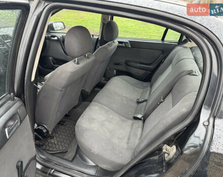 Черный Опель Астра, объемом двигателя 1.7 л и пробегом 300 тыс. км за 2999 $, фото 14 на Automoto.ua