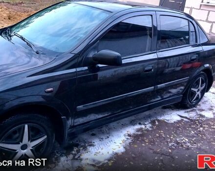 Черный Опель Астра, объемом двигателя 1.6 л и пробегом 256 тыс. км за 3300 $, фото 1 на Automoto.ua