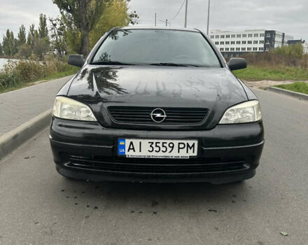 Черный Опель Астра, объемом двигателя 1.36 л и пробегом 193 тыс. км за 3700 $, фото 1 на Automoto.ua