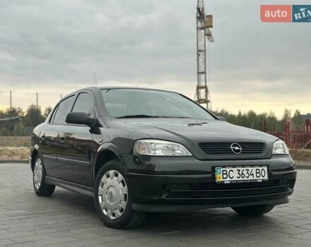 Черный Опель Астра, объемом двигателя 1.4 л и пробегом 216 тыс. км за 3999 $, фото 5 на Automoto.ua