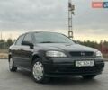 Черный Опель Астра, объемом двигателя 1.4 л и пробегом 216 тыс. км за 3999 $, фото 5 на Automoto.ua