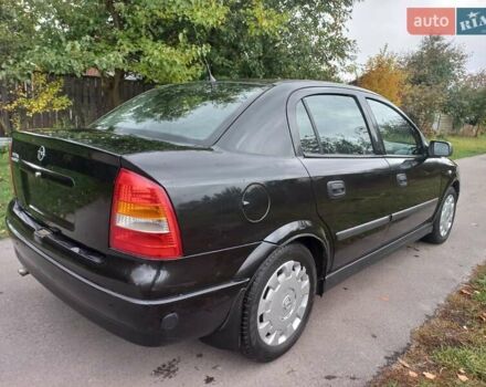 Черный Опель Астра, объемом двигателя 1.4 л и пробегом 220 тыс. км за 4500 $, фото 4 на Automoto.ua