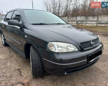 Черный Опель Астра, объемом двигателя 1.4 л и пробегом 230 тыс. км за 4500 $, фото 4 на Automoto.ua