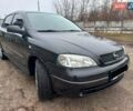 Черный Опель Астра, объемом двигателя 1.4 л и пробегом 230 тыс. км за 4500 $, фото 4 на Automoto.ua