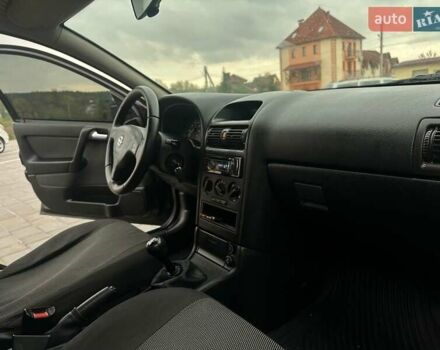Черный Опель Астра, объемом двигателя 1.4 л и пробегом 216 тыс. км за 3999 $, фото 21 на Automoto.ua
