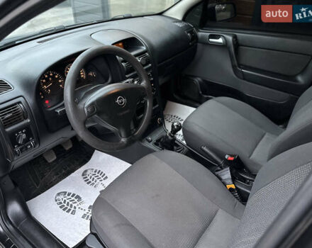 Черный Опель Астра, объемом двигателя 1.4 л и пробегом 102 тыс. км за 3600 $, фото 21 на Automoto.ua