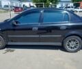 Черный Опель Астра, объемом двигателя 1.4 л и пробегом 105 тыс. км за 4800 $, фото 3 на Automoto.ua