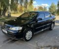 Черный Опель Астра, объемом двигателя 1.4 л и пробегом 270 тыс. км за 3203 $, фото 4 на Automoto.ua