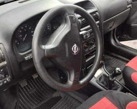 Черный Опель Астра, объемом двигателя 1.6 л и пробегом 85 тыс. км за 7000 $, фото 2 на Automoto.ua