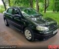 Черный Опель Астра, объемом двигателя 1.4 л и пробегом 200 тыс. км за 3499 $, фото 3 на Automoto.ua