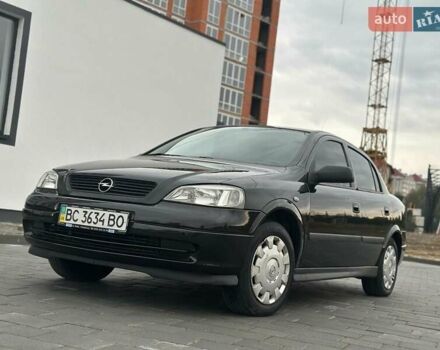 Черный Опель Астра, объемом двигателя 1.4 л и пробегом 216 тыс. км за 3999 $, фото 12 на Automoto.ua