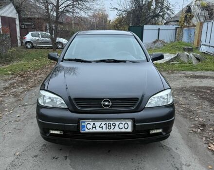 Черный Опель Астра, объемом двигателя 1.6 л и пробегом 250 тыс. км за 3750 $, фото 11 на Automoto.ua