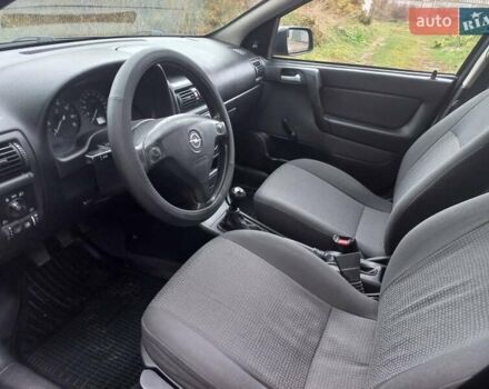 Черный Опель Астра, объемом двигателя 1.4 л и пробегом 220 тыс. км за 4500 $, фото 9 на Automoto.ua