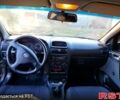 Черный Опель Астра, объемом двигателя 1.4 л и пробегом 250 тыс. км за 3200 $, фото 7 на Automoto.ua