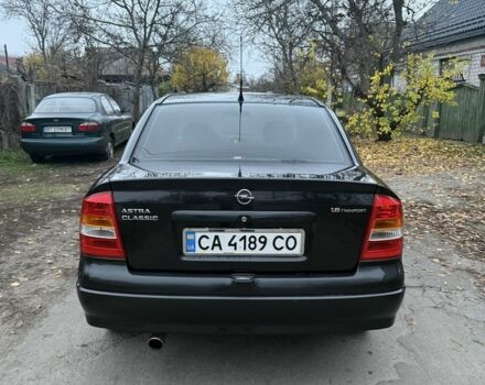 Черный Опель Астра, объемом двигателя 1.6 л и пробегом 250 тыс. км за 3750 $, фото 4 на Automoto.ua
