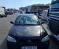 Черный Опель Астра, объемом двигателя 1.4 л и пробегом 250 тыс. км за 3203 $, фото 1 на Automoto.ua