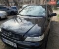 Черный Опель Астра, объемом двигателя 1.4 л и пробегом 200 тыс. км за 3800 $, фото 1 на Automoto.ua