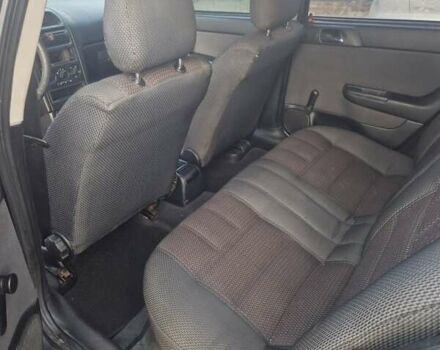 Черный Опель Астра, объемом двигателя 1.39 л и пробегом 180 тыс. км за 2550 $, фото 6 на Automoto.ua