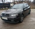 Чорний Опель Астра, об'ємом двигуна 1.4 л та пробігом 222 тис. км за 3400 $, фото 1 на Automoto.ua