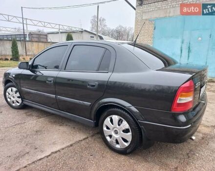 Черный Опель Астра, объемом двигателя 1.4 л и пробегом 230 тыс. км за 4500 $, фото 7 на Automoto.ua