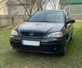 Чорний Опель Астра, об'ємом двигуна 1.4 л та пробігом 175 тис. км за 2679 $, фото 1 на Automoto.ua