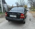 Черный Опель Астра, объемом двигателя 1.6 л и пробегом 250 тыс. км за 3750 $, фото 5 на Automoto.ua