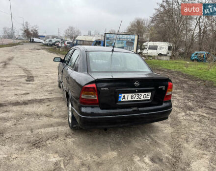Черный Опель Астра, объемом двигателя 1.7 л и пробегом 300 тыс. км за 2999 $, фото 9 на Automoto.ua