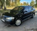 Черный Опель Астра, объемом двигателя 1.4 л и пробегом 270 тыс. км за 3203 $, фото 1 на Automoto.ua
