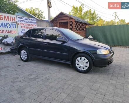 Черный Опель Астра, объемом двигателя 1.6 л и пробегом 100 тыс. км за 2800 $, фото 4 на Automoto.ua