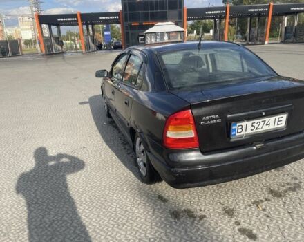 Черный Опель Астра, объемом двигателя 1.4 л и пробегом 212 тыс. км за 3650 $, фото 5 на Automoto.ua