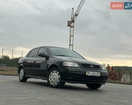 Черный Опель Астра, объемом двигателя 1.4 л и пробегом 216 тыс. км за 3999 $, фото 30 на Automoto.ua