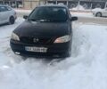 Черный Опель Астра, объемом двигателя 1.6 л и пробегом 231 тыс. км за 4250 $, фото 1 на Automoto.ua