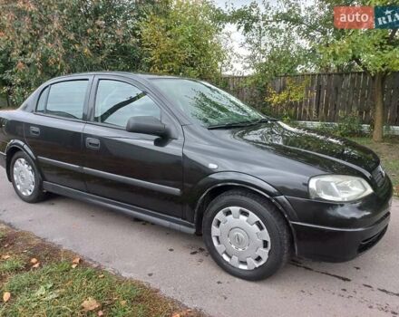 Черный Опель Астра, объемом двигателя 1.4 л и пробегом 220 тыс. км за 4500 $, фото 1 на Automoto.ua