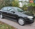 Черный Опель Астра, объемом двигателя 1.4 л и пробегом 220 тыс. км за 4500 $, фото 1 на Automoto.ua