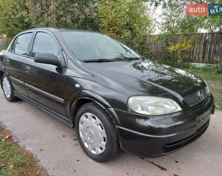 Черный Опель Астра, объемом двигателя 1.4 л и пробегом 220 тыс. км за 4500 $, фото 3 на Automoto.ua