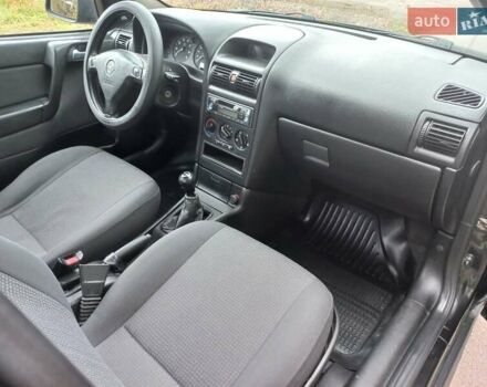 Черный Опель Астра, объемом двигателя 1.4 л и пробегом 220 тыс. км за 4500 $, фото 10 на Automoto.ua