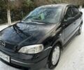 Черный Опель Астра, объемом двигателя 1.4 л и пробегом 620 тыс. км за 2800 $, фото 1 на Automoto.ua
