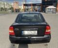 Черный Опель Астра, объемом двигателя 1.4 л и пробегом 212 тыс. км за 3650 $, фото 1 на Automoto.ua