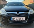 Черный Опель Астра, объемом двигателя 1.6 л и пробегом 172 тыс. км за 6950 $, фото 2 на Automoto.ua