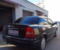 Черный Опель Астра, объемом двигателя 1.38 л и пробегом 134 тыс. км за 4800 $, фото 6 на Automoto.ua