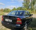 Черный Опель Астра, объемом двигателя 1.38 л и пробегом 144 тыс. км за 4600 $, фото 2 на Automoto.ua
